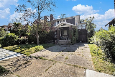 View of front facade featuring brick siding and a front yard
