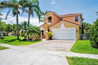 Relax in your front courtyard surrounded by a beau