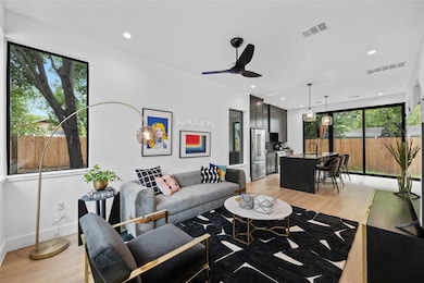 Living room featuring light wood-type flooring, r