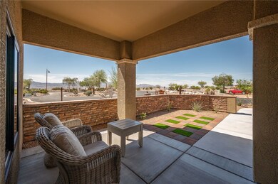 View of front patio and courtyard wall.
