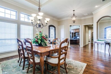 An open dining area and large foyer greet you when you walk through the front door.
