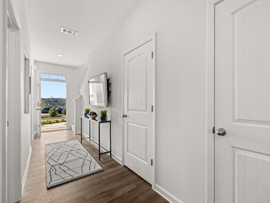 pearson front entryway with carpet staircase to th