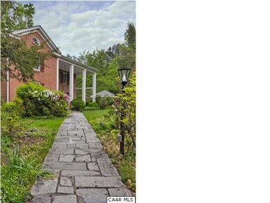 Stone path leading to the front entrance.