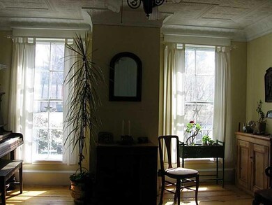 Living Room. The front half of a...