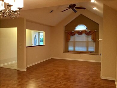 Entryway and Living Room:  New glass front door we