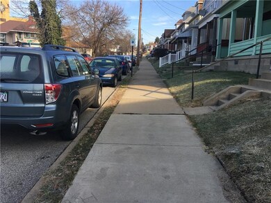 Another view of the neighborhood with sidewalks.