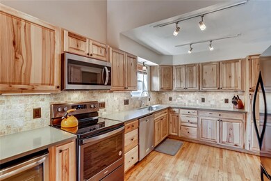 All new kitchen w knotty Alder, full stone backspl