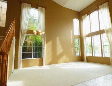 Grand formal living and dining rooms with cathedra
