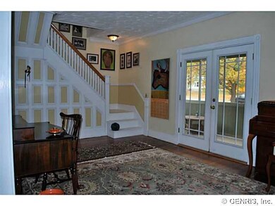 Living Room Formal living room features atrium doo