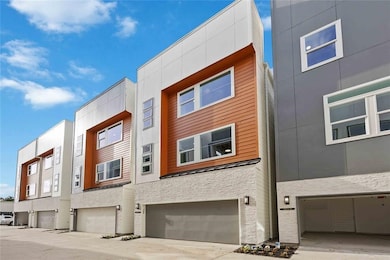 Within minutes of all Heights has to offer, this 3 bedroom, 3 full bath, and one half bath home is in a gated community.
 
has a beautiful modern elevation and large windows that bring in ample natural light throughout the home.