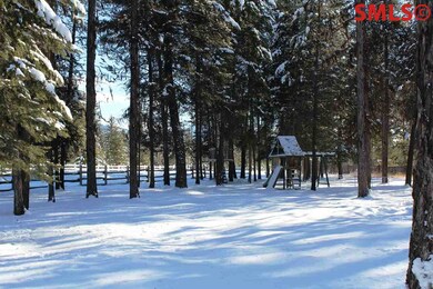 Split rail fence around portion of property.