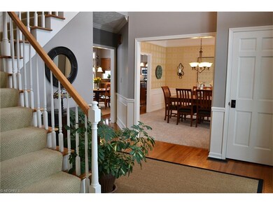 Foyer ls flanked by the dining room and living roo