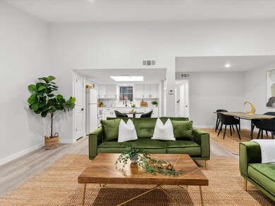 Living room featuring light hardwood / wood-style 