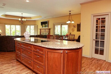 Kitchen has hardwoods, Sub Zero fridge & nice gran