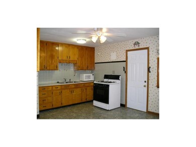Kitchen with view of back door