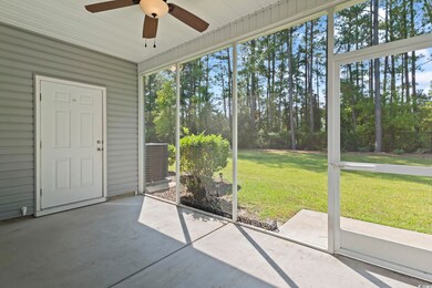 Unfurnished sunroom with ceiling fan