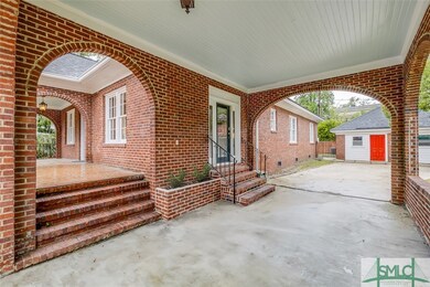 Car portico to front porch or additional parking o