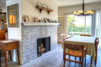 Dining Area - A fireplace and view of the rear yar