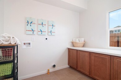 Full size laundry room.