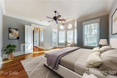 Main floor master bedroom it light and airy. The p