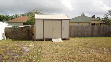 Nice size screen porch to enjoy. The back yard is