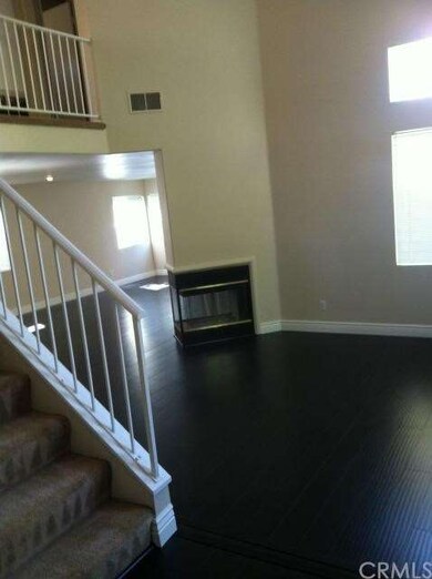 Living room with fireplace/wood floor