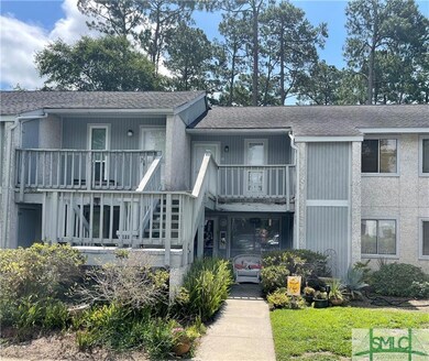 Lower level with covered front porch.