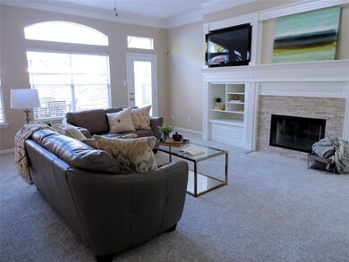 Open floor plan with door to patio.