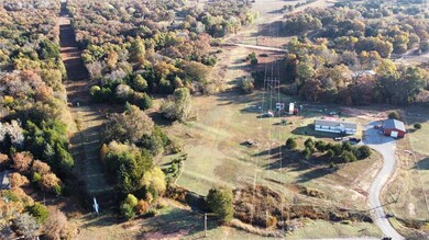 Aerial view of property's location featuring rural landscape
