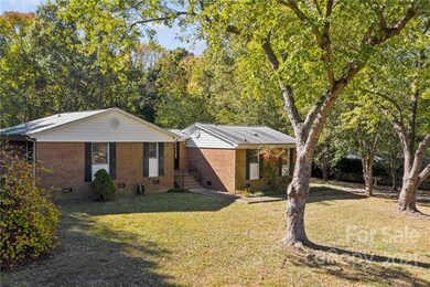 Nice big front yard.  Septic tank and leach field located in front yard.
