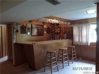 Exterior Front. Custom bar