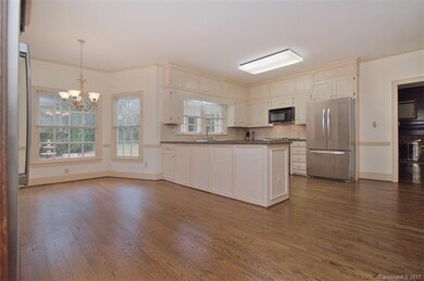 The hardwoods throughout the downstairs continue i