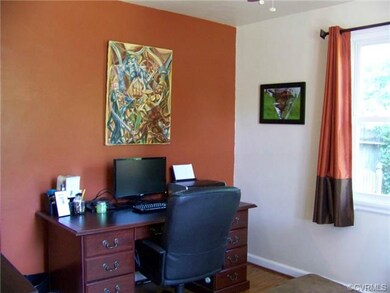 FIRST FLOOR BEDROOM/HOME OFFICE  WITH WOOD FLOORS 
