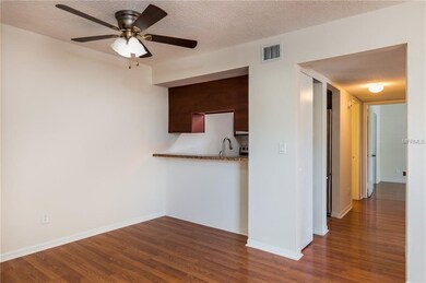 View of the dining area and Kitchen pass thru