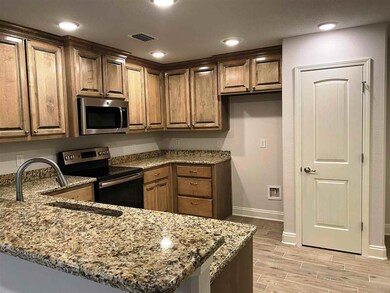 Kitchen is designed with granite & stainless!
