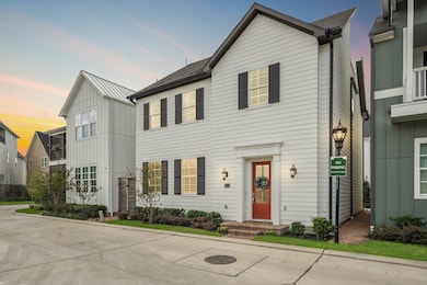 This like new home offers a charming curbside appe