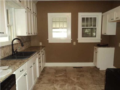 Remodeled Kitchen with Granite Countertops & Stain