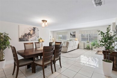 Kitchen, living and dining are open to one another.