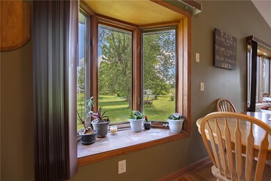 Bay window facing the south/woods/field from kitch