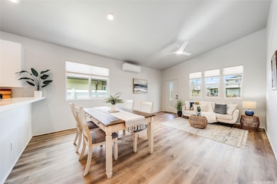 Dining and living room space, exterior access to b