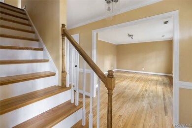 Front Staircase w/ painted risers, hardwood floori