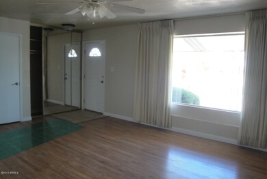 ENTRY TO LIVING ROOM WITH PERGO FLOOR