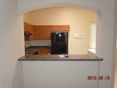 View into kitchen from living room