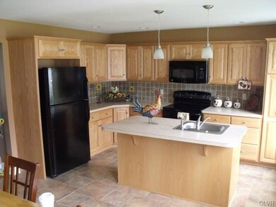 Model pictured... 1st floor kitchen with eat in di