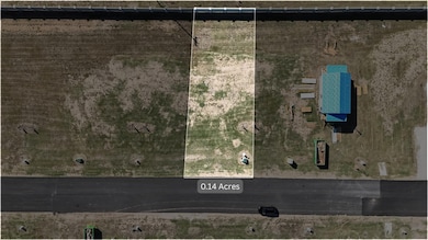 Aerial view of property's location with property parcel outlined
