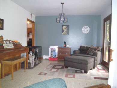 Sitting area off of living room leads out to rear deck