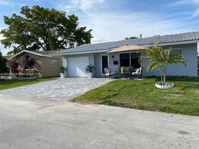 7303 NW 57th Dr, Tamarac, FL 33321 - photo 2