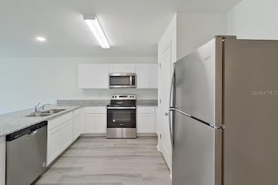 1128 Hayes Ave S, Lehigh Acres, FL 33974 - photo 2