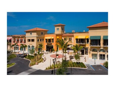 View showing some of the stores along Fashion Drive with some commercial office space on 2nd floor.