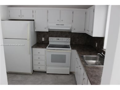 Capri Gardens Condominiums unit C206, Miami, FL 33161 - photo 2